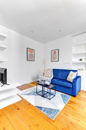 Lägenhet City - 1 dubbelsäng med bäddsoffa - icke-rökare - kök | Vardagsrum | 40-tums smart-tv med satellitkanaler