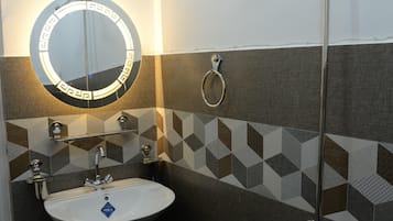 Shower, bidet, towels, soap