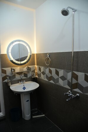 Dutxa, bidet, tovalloles i sabó 