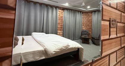 Spacious 9-bedroom hotel suites in beautiful Skardu with WiFi