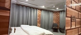 Spacious 9-bedroom hotel suites in beautiful Skardu with WiFi