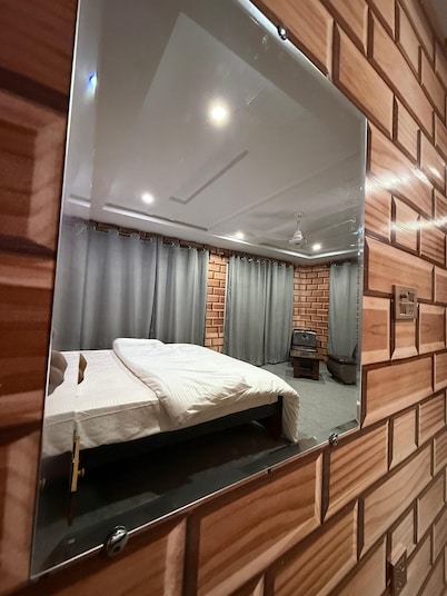 Spacious 9-bedroom hotel suites in beautiful Skardu with WiFi