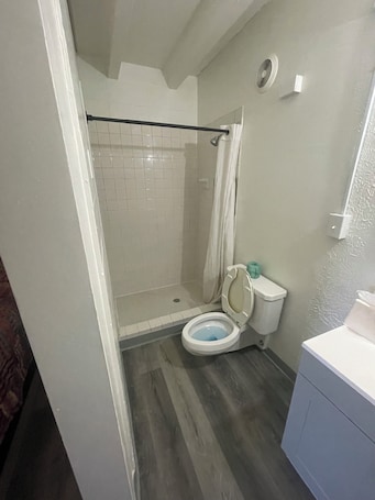 Standard Single Room | Bathroom | Shower, towels, toilet paper. Relax Inn