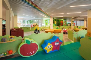 A children's play area with colorful furniture and toys. - Family coastal escape with water park and beach (Bibione)