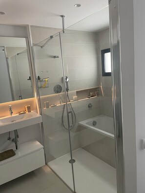 Shower, hair dryer, towels, soap