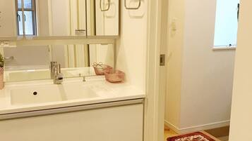 Eco-friendly toiletries, hair dryer, bidet, towels