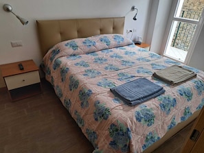 2 bedrooms, desk, iron/ironing board, travel crib