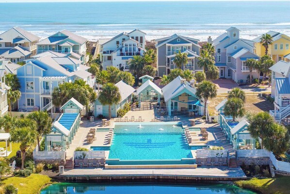 A heated pool - Charming Luxury Beach Condo at Cinnamon Shore! By Restaurants+Shops+Amenities (port aransas)