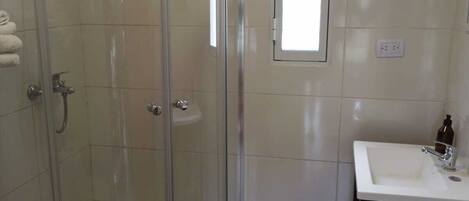 Hair dryer, towels, soap, toilet paper