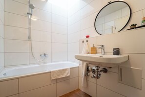 Hair dryer, towels, soap, toilet paper