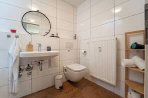 Hair dryer, towels, soap, toilet paper