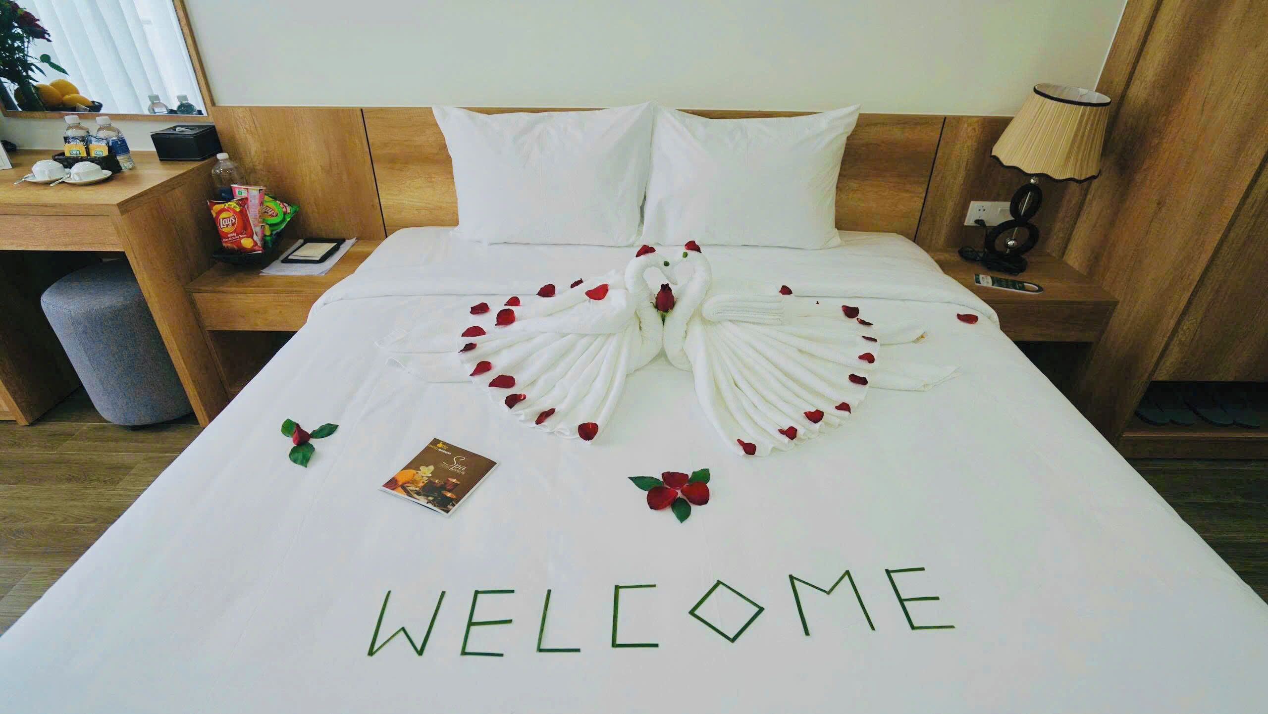 Family Triple Room, River View | Minibar, in-room safe, desk, laptop workspace