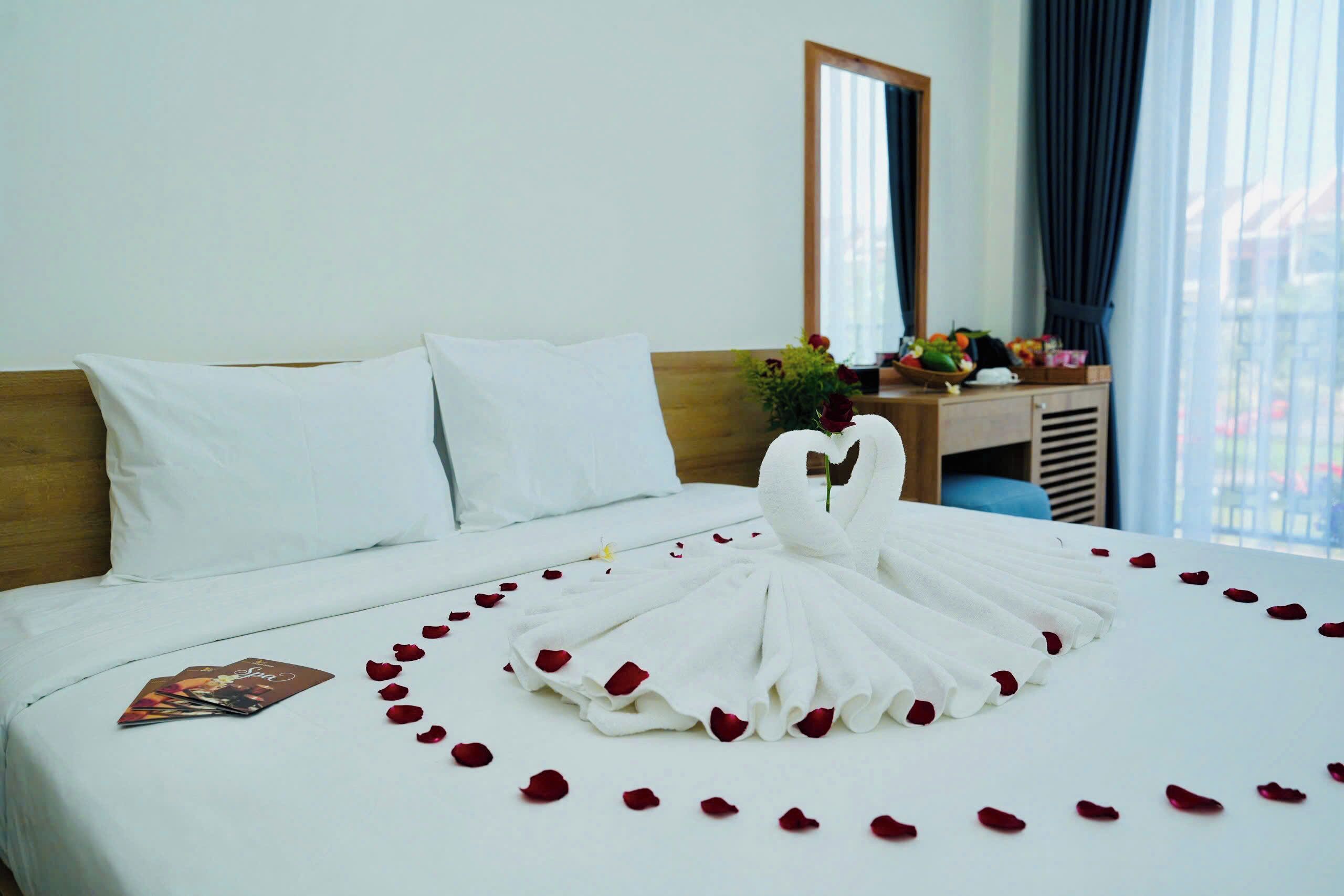 Deluxe Double Room, Balcony, Pool View | Minibar, in-room safe, desk, laptop workspace