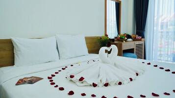 Deluxe Double Room, Balcony, Pool View | Minibar, in-room safe, desk, laptop workspace