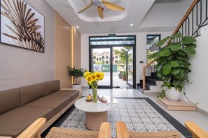 Chambre Premium, 1 chambre, vue jardin | Coin séjour