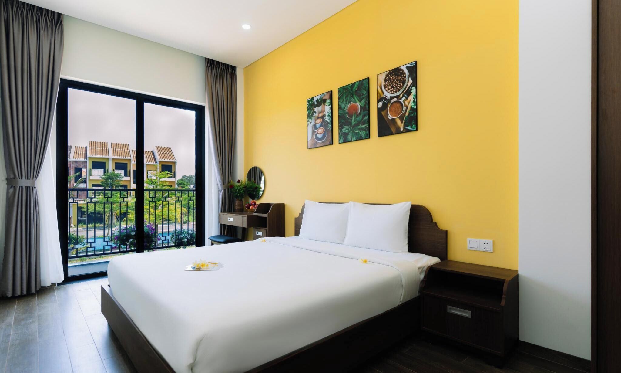 Deluxe Double Room, Balcony, Pool View | Minibar, in-room safe, desk, laptop workspace