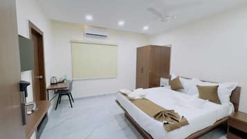 Superior Double Room, City View | In-room safe, desk, laptop workspace, iron/ironing board