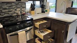 Mobile Home (Wildwood glamping trailer (Site #72)) | Private kitchen - Chinook Rv Resort (Klamath)