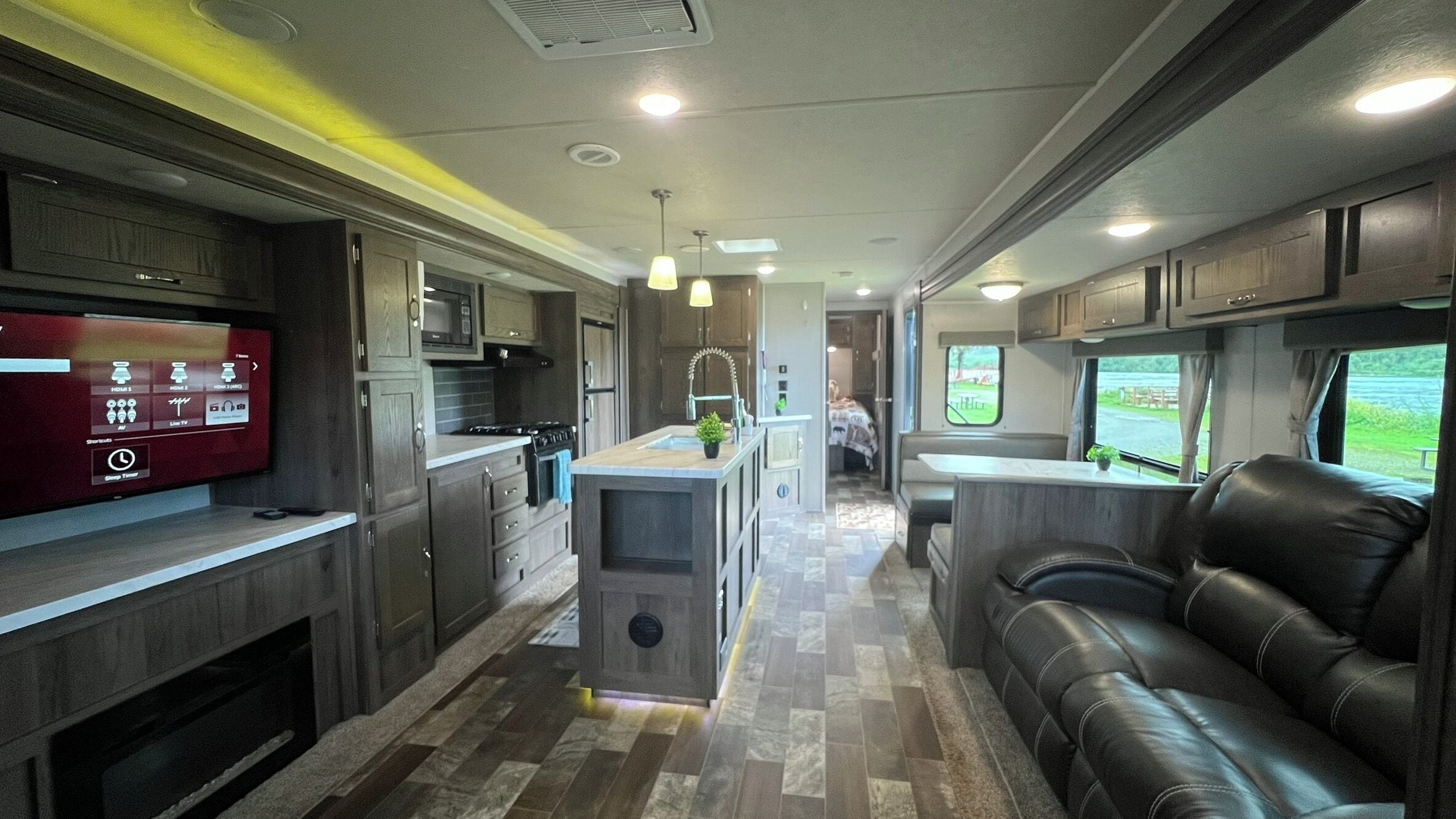 EastToWest Glamping Camper (Rv Site #15) | Living area