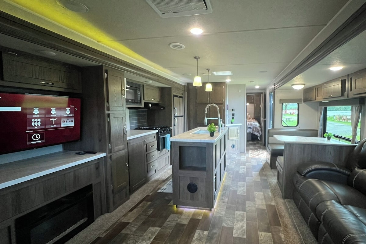 EastToWest Glamping Camper (Rv Site #15) | Living area