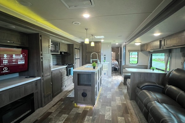 EastToWest Glamping Camper (Rv Site #15) | Living area