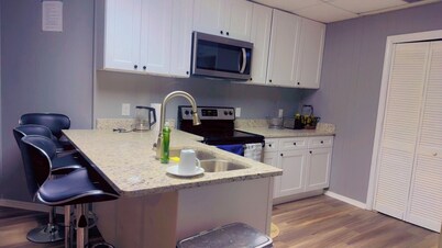 Room BLAZE, A Charming 1-bedroom with WiFi, AC, T.V and shared bathroom 