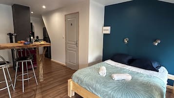 1 bedroom, desk, iron/ironing board, travel crib