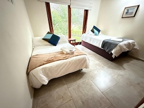 Family House, Multiple Beds, Garden View | 2 bedrooms, in-room safe, blackout curtains, iron/ironing board
