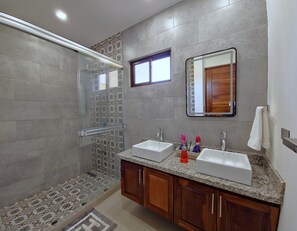 Shower, towels, soap, toilet paper