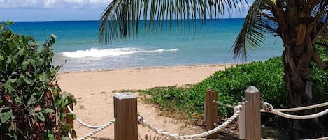 On the beach, sun loungers, beach towels