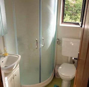 Hair dryer, towels, soap, toilet paper