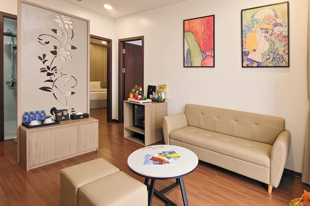Family Suite, 2 Bedrooms, City View | Living room | Smart TV