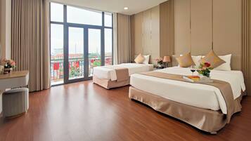 Standard Triple Room, Balcony | Minibar, desk, laptop workspace, blackout curtains