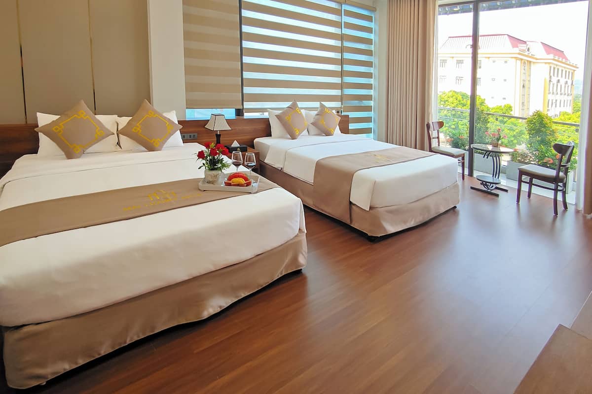 Superior Quadruple Room, City View | 1 bedroom, minibar, desk, laptop workspace