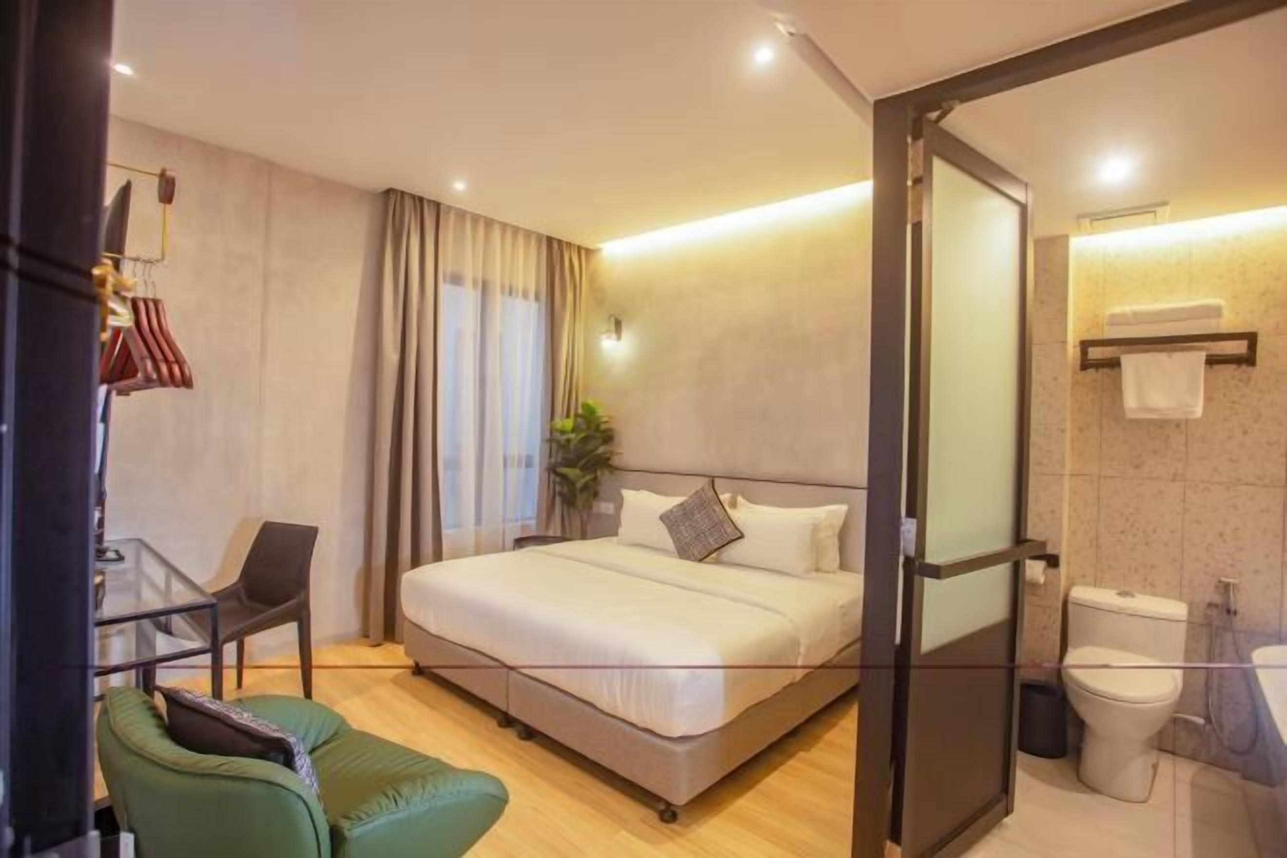 Desk, laptop workspace, blackout curtains, iron/ironing board