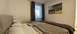 1 slaapkamer, een bureau, gratis wifi, beddengoed