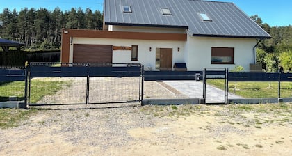 Spacious 5-bedroom villa next to the forest and a lake