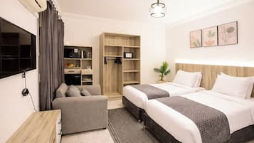 Deluxe Double or Twin Room, Non Smoking | In-room safe, desk, laptop workspace, blackout curtains