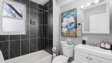 Shower, hair dryer, towels, soap