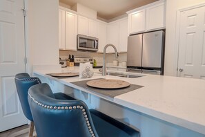 Fridge, microwave, oven, stovetop - Peaceful 2BR Townhome w/ WiFi + AC – Pet Friendly, Near Parks! (St. Augustine)