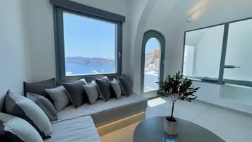 Honeymoon Suite, 2 Bedrooms, Sea View | Living area | 48-inch Smart TV with digital channels