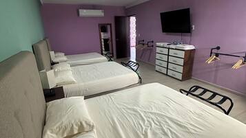 Suite familiar | Minibar, wifi gratis y ropa de cama