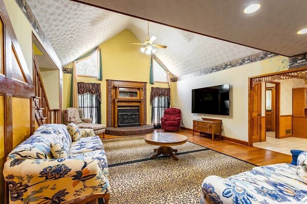 Smart TV, fireplace, books