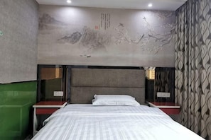 A hotel room with a bed, nightstands, a wall mural, and a patterned wall. - Xinhao Fashion Hotel (Shanghai)