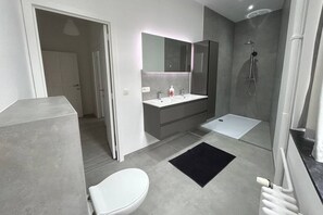 Hair dryer, towels, soap, shampoo