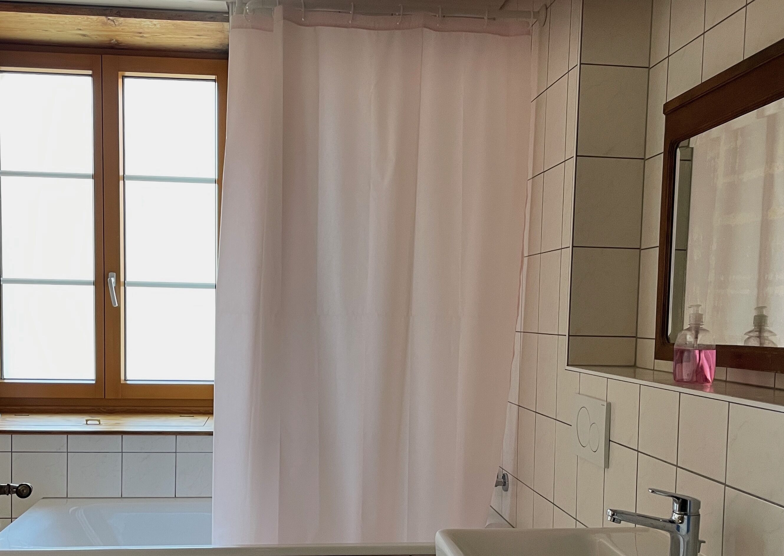 Shower, hair dryer, towels, toilet paper