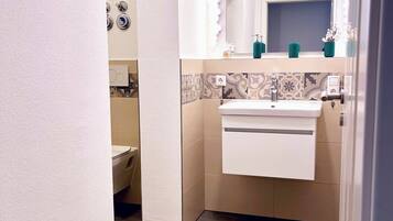 Hair dryer, towels, soap, toilet paper