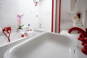 Hair dryer, bidet, towels, soap