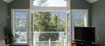 Mountain and sunset views with deck.