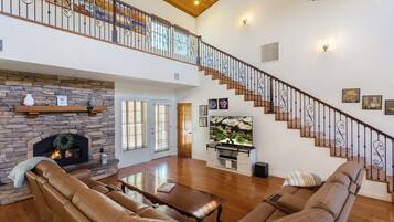 Smart TV, fireplace, DVD player, foosball